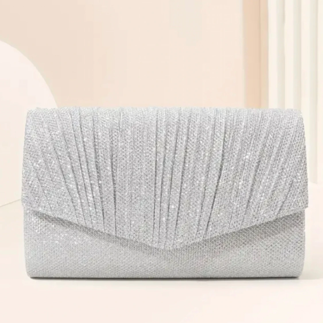 Silvrig glitterväska