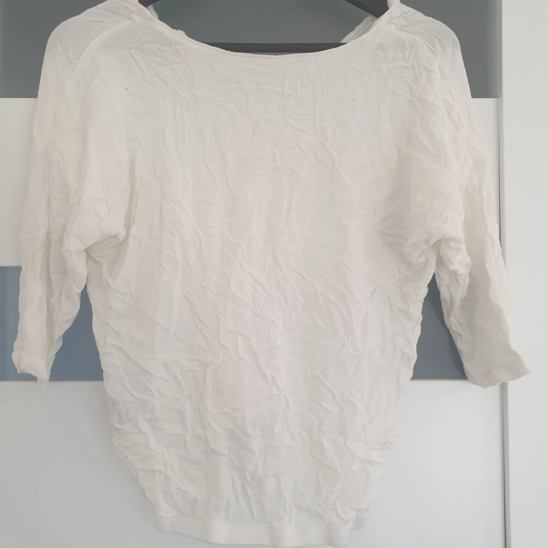 En vit bluse - 90