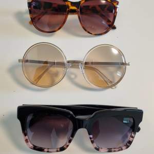 Tre par olika solglasögon. Oanvända.  20 kr/styck