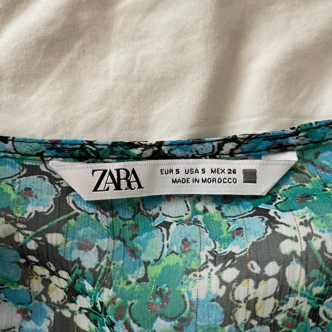 Blommig klänning - 90