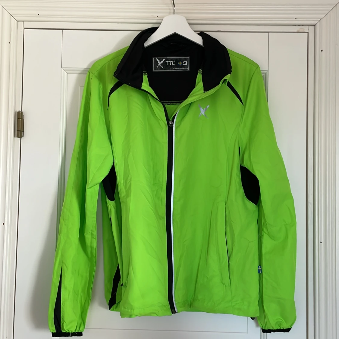 Grön vindjacka från XTTL