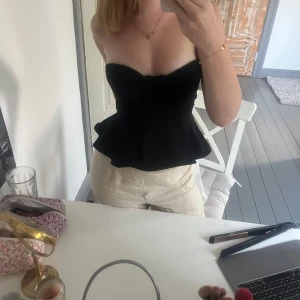 Bandeau topp - Jätte fin top, sömen har börjat släppa m(se bild 3) men det är inget som syns 