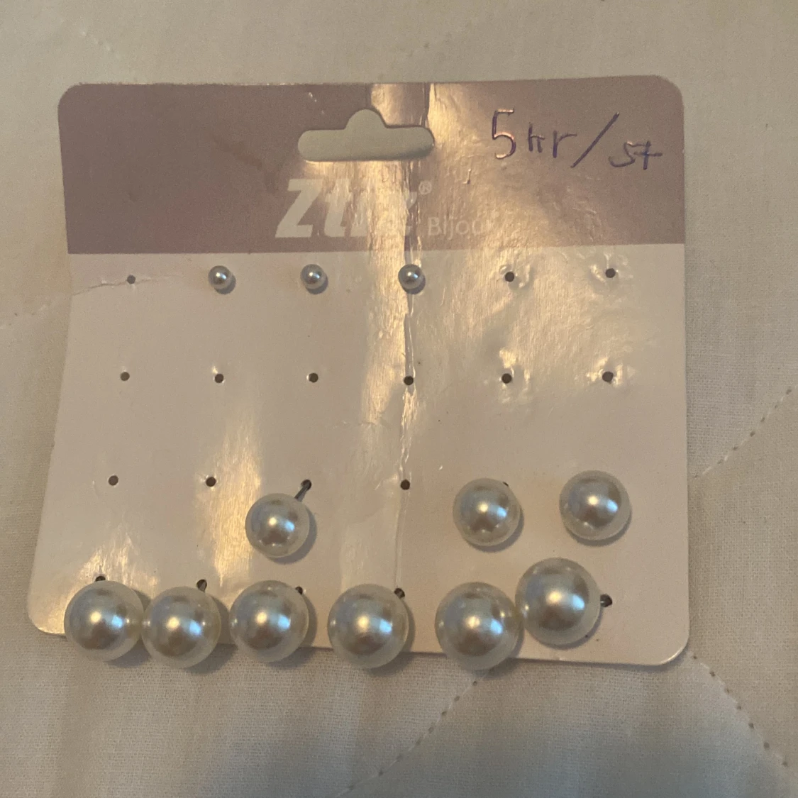Pärlörhängen från Zia