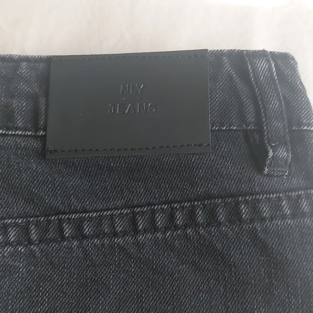 Black jeans skirt from Nelly. Short.. Kjolar.