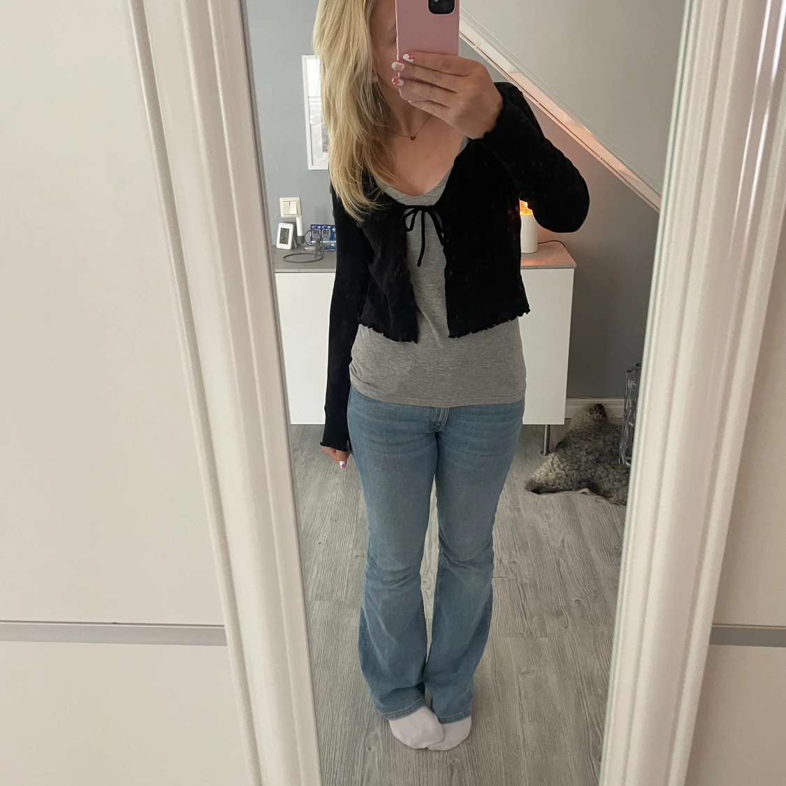 Svart kofta med knyt