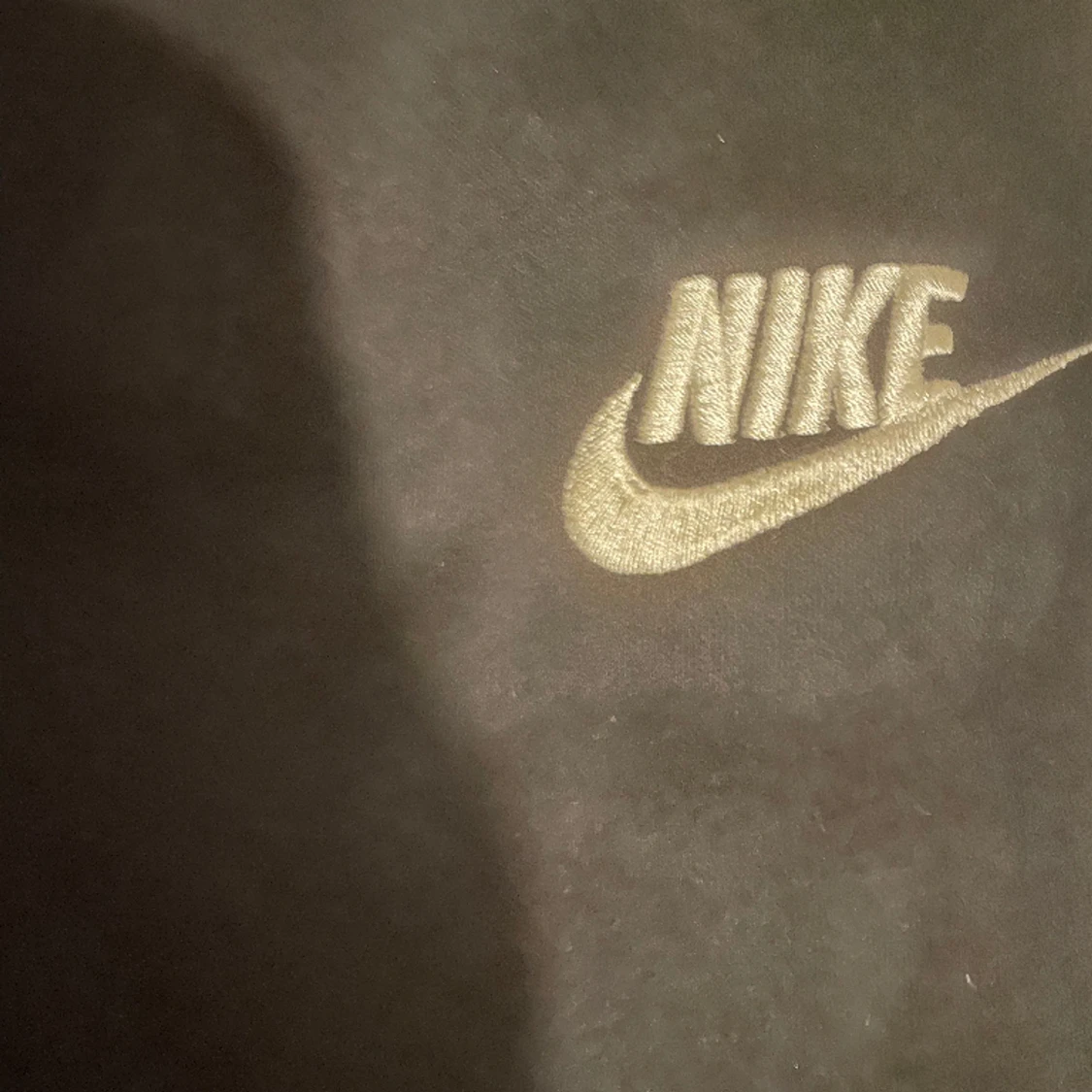 Svarta Nike byxor - 90