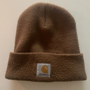 Carhartt mössa - Brun, bra skick. Frakt ca 40kr.