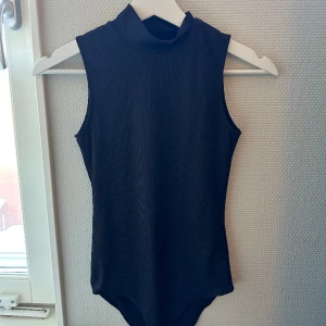 Body - Endast använd en gång. Ribbad body i skönt material! 