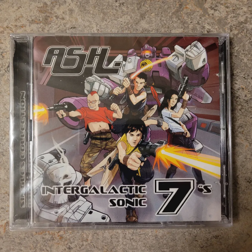 Ash intergalatic sonic 7 CD, den är oöppnad och fortfarande inslagen i sin originalplast. Övrigt.
