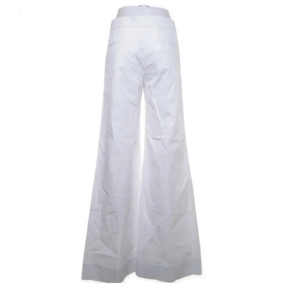 Vida kostymbyxor från Filippa K i vitt, storlek S. Är lite smutsiga längst ned på benen. Jeans & Byxor.