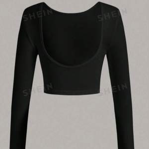 svart tröja med öppen rygg i storlek xs, jätte fin på