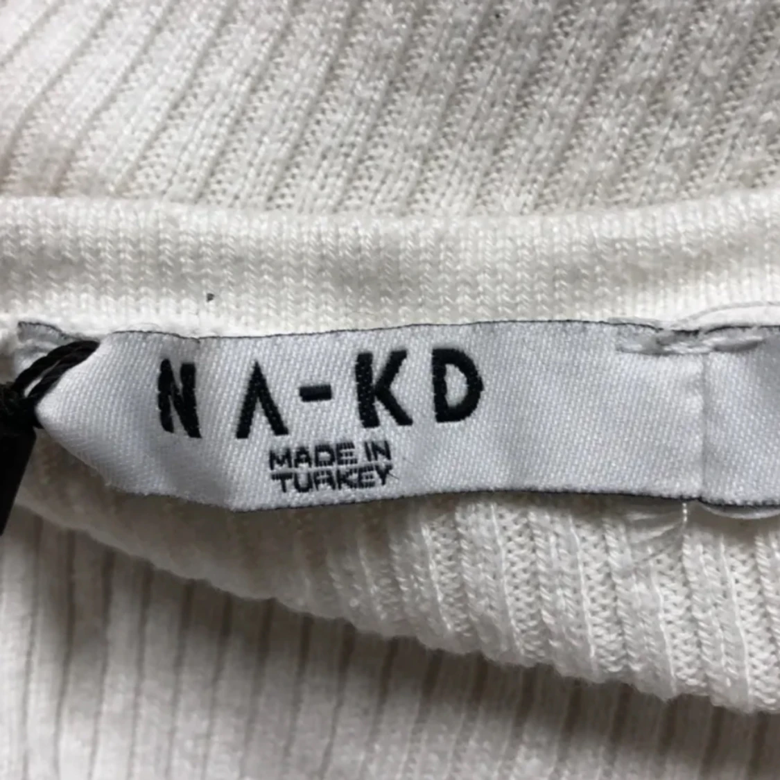 Ribbstickad tröja - 91