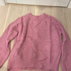 Rosa stickad tröja - Rosa stickad tröja i strl S