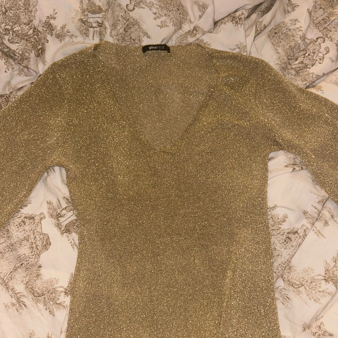 Glittrig långklänning - 91