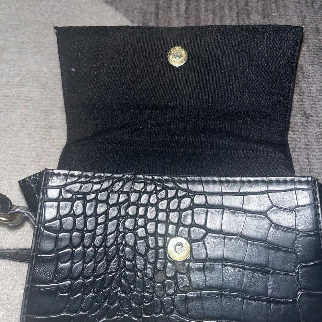 Svart axelrems väska