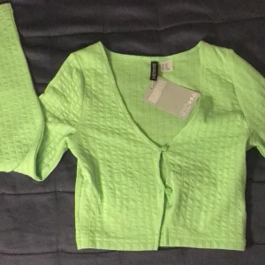Topp - En söt topp från H&M som jag aldrig använt!  