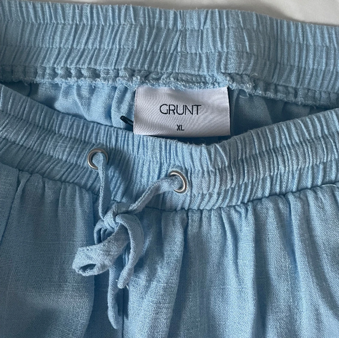 Ljusblå linnebyxor - 90