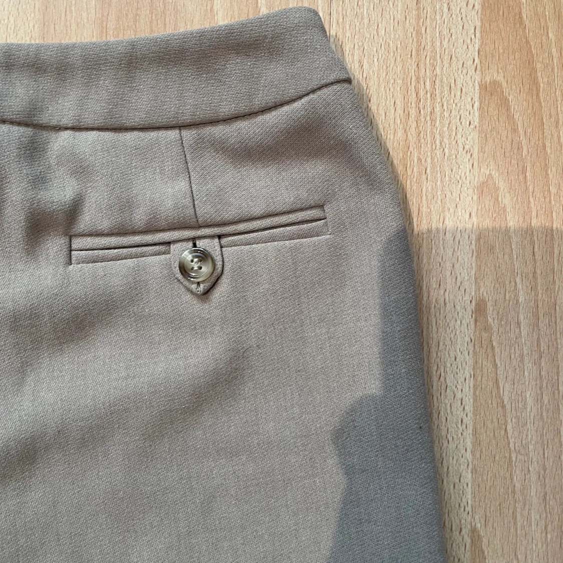 Beigea kostymbyxor  - 90