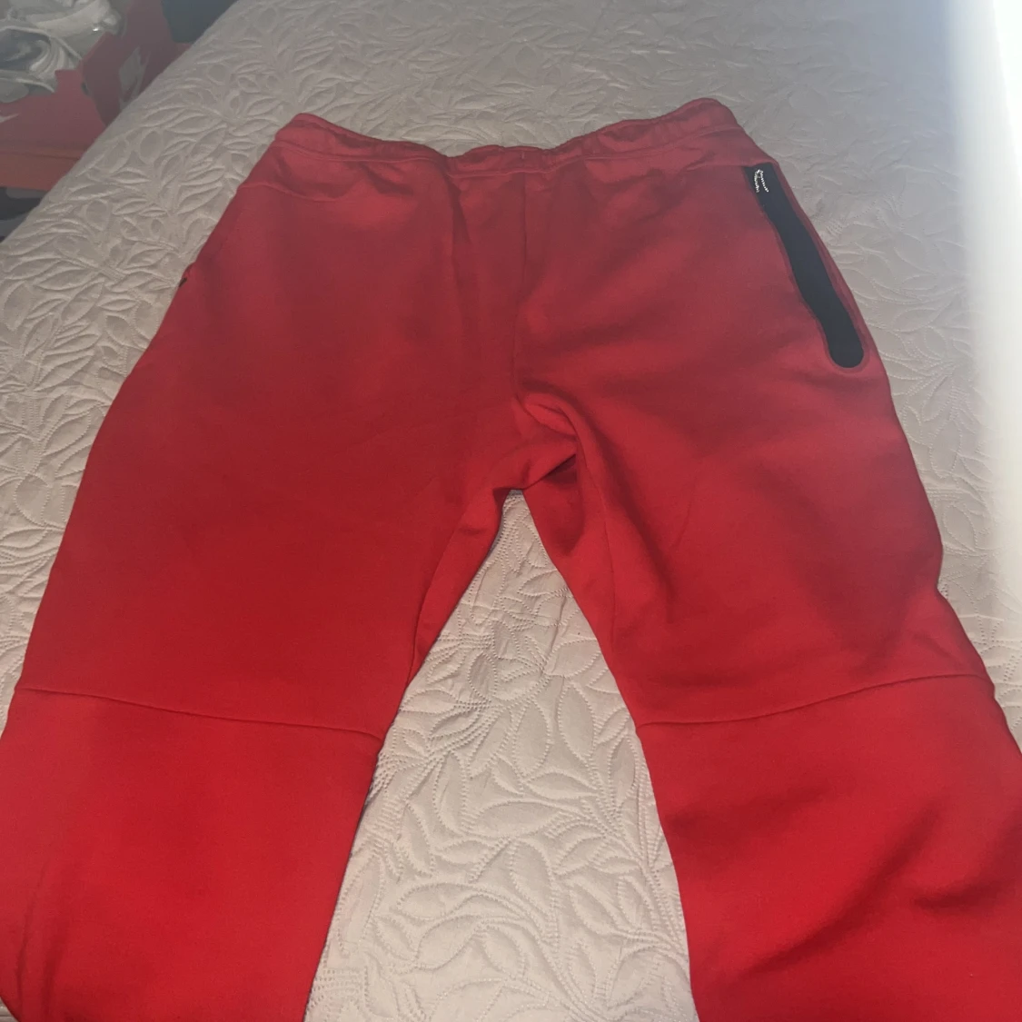 Röda Nike byxor - 92