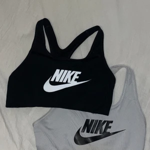 Sport bh - Säljer två Nike sport bhar i storlek XS (passar S). Båda är i använt skick och den vita lite missfärgad. Jättesköna och snygga. Köp en för 60 eller båda för 99kr.