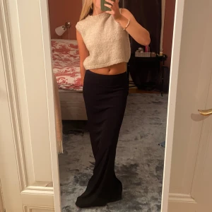 Lågmidjad maxikjol - Använd en gång