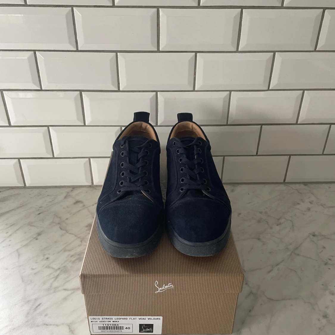 Christian Louboutin  - 90