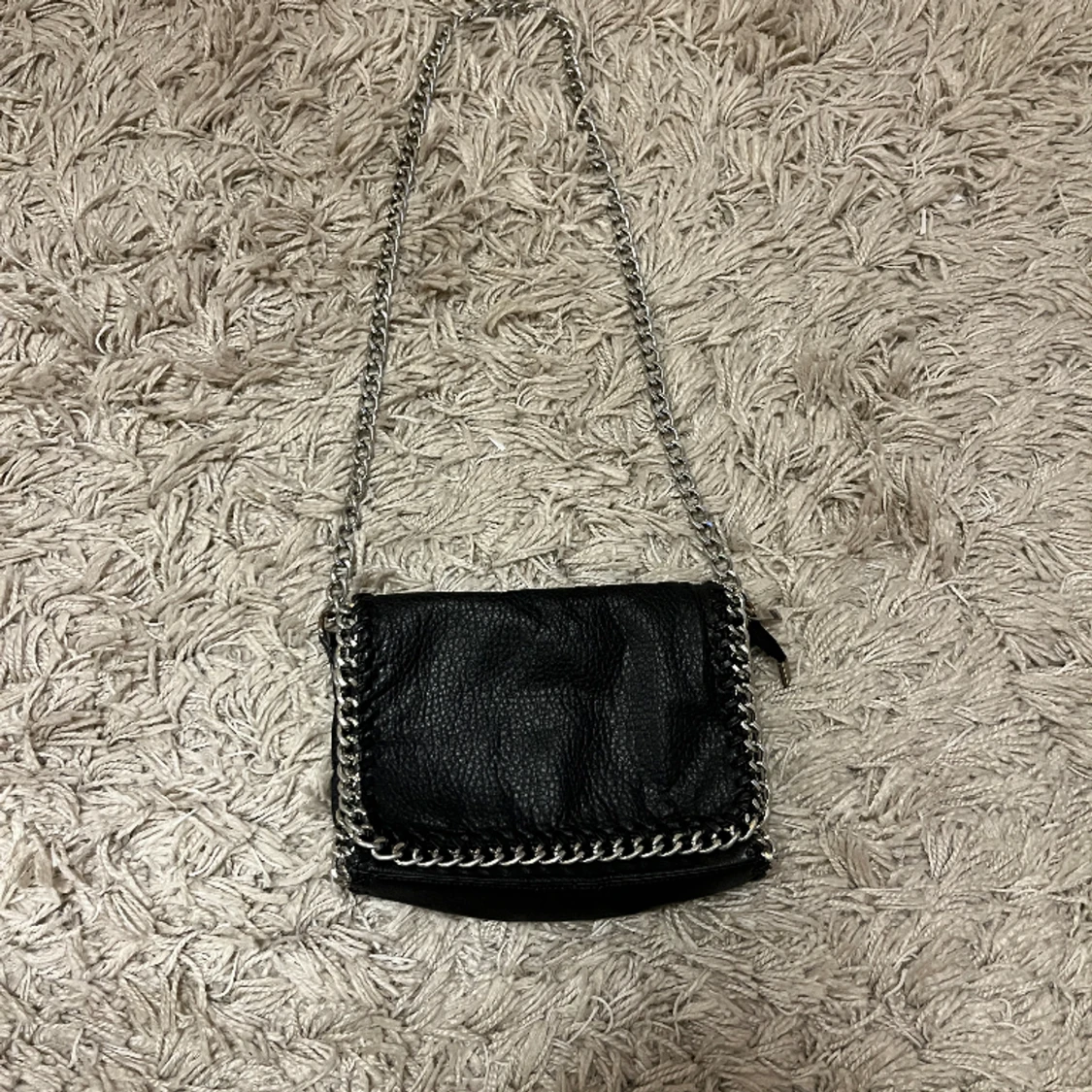 Tiamo handväska svart.