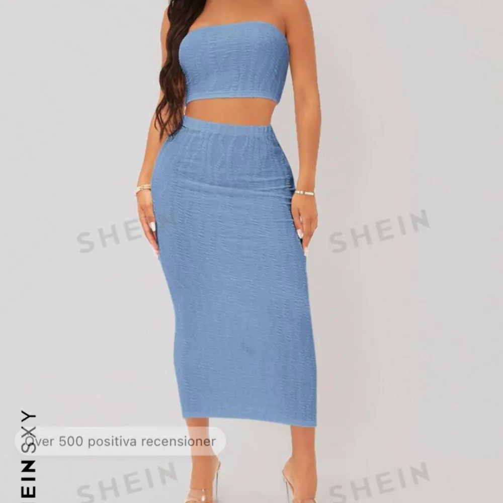 Ett blått set från SHEIN, kjol och topp. Aldrig använd, originalpris 149kr.. Klänningar.