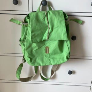 Green neon backpack  - Used bu in good condition  33*35