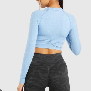 Gymshark topp - Gymshark topp i modelllen ” adapt marl seamless” inte använd då den är lite liten för mig❤️
