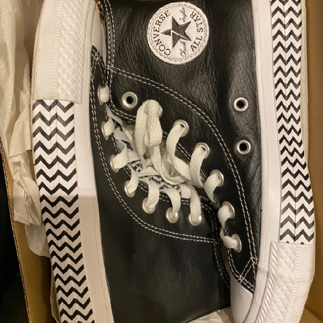 Converse läder