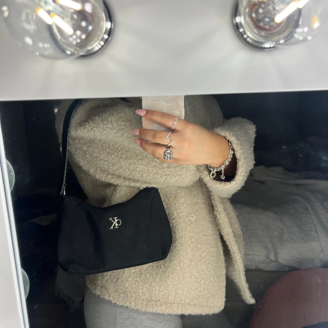 Liten handvĂ€ska đ€