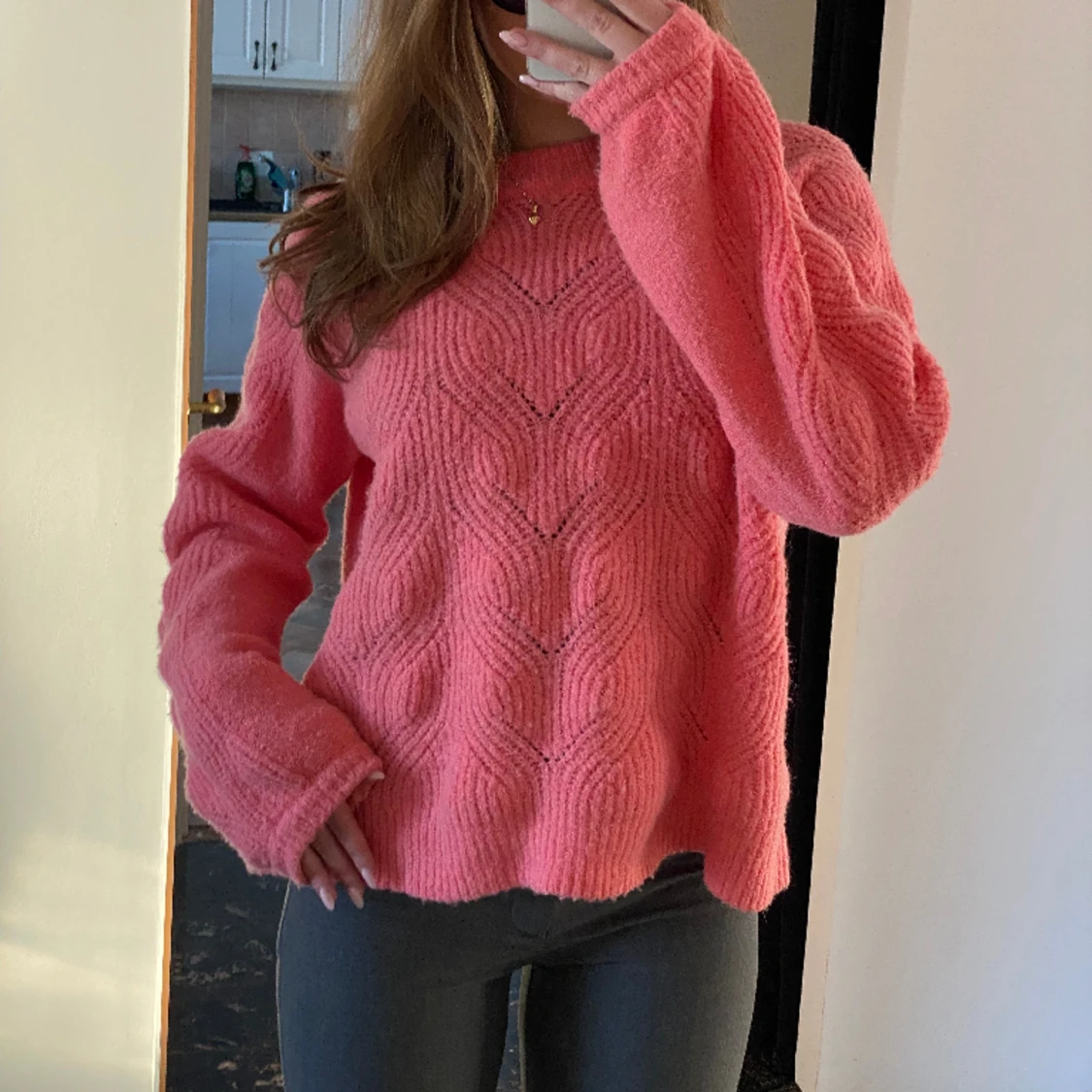 Rosa stickad tröja