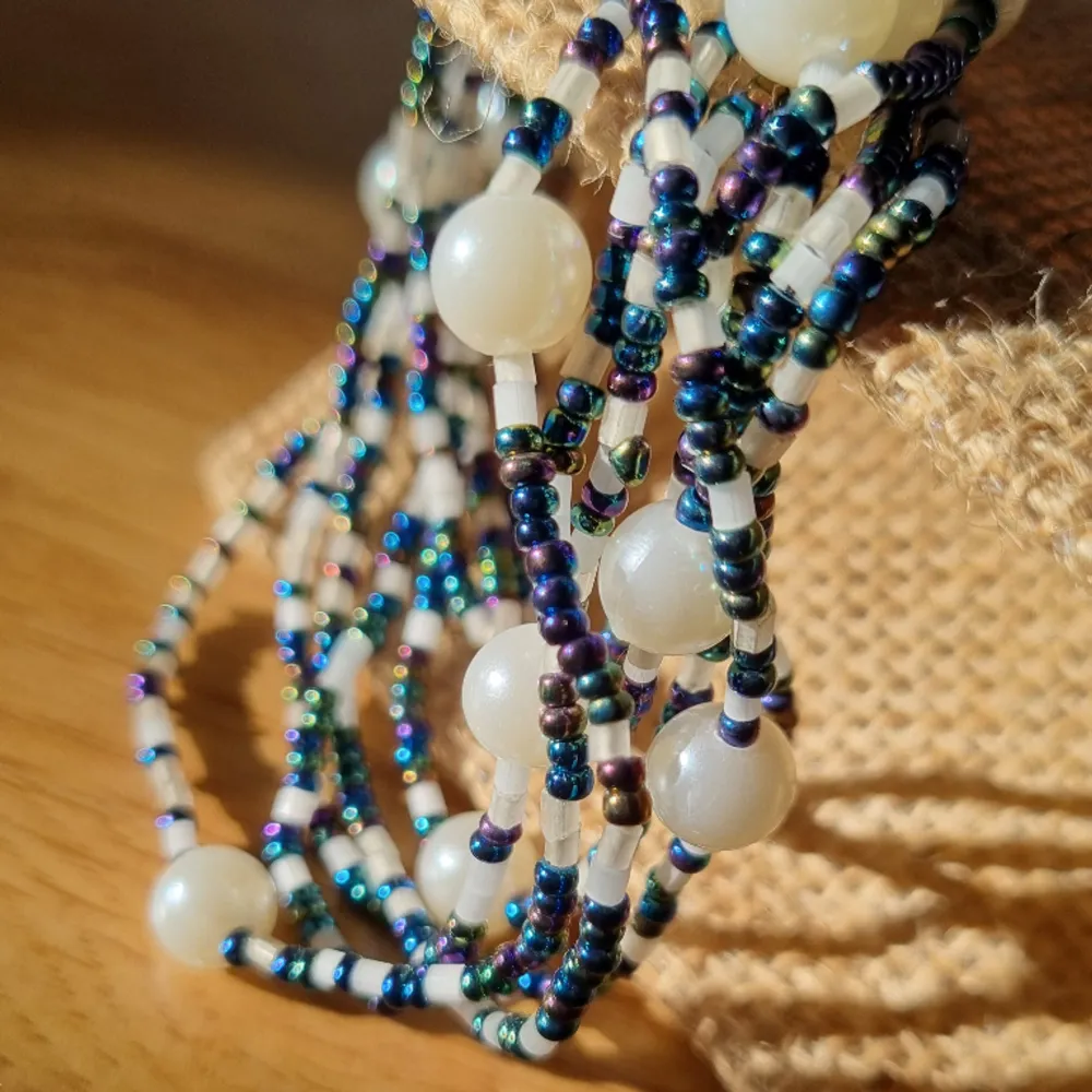 Long strand of mix beads and pearls that can signify your uniqueness and express yourself in style.   Handmade/Handcrafted.  3way fashion accessory necklace,bracelet and anklet.  Brandnew without tag.. Accessoarer.