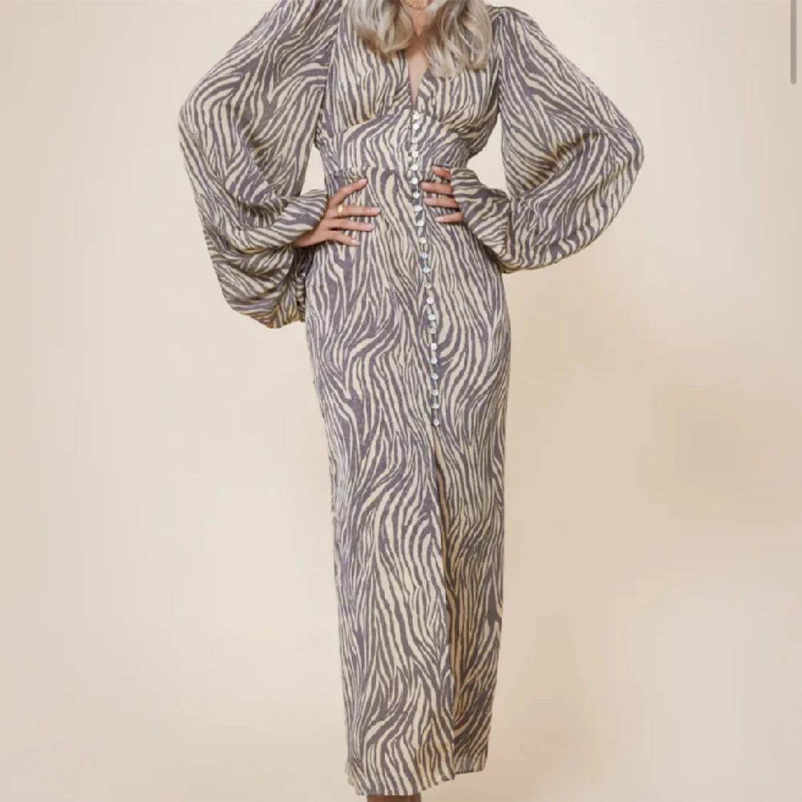 Adoore klänning strl 40