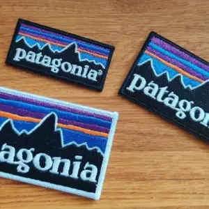 3 st nya tygmärken med Patagonia-motiv.  