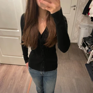 Snygg v ringad kofta - Kom ej till användning 