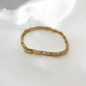 Guld armband  - Material: rostfritt stål samt 18 k guldpläterad