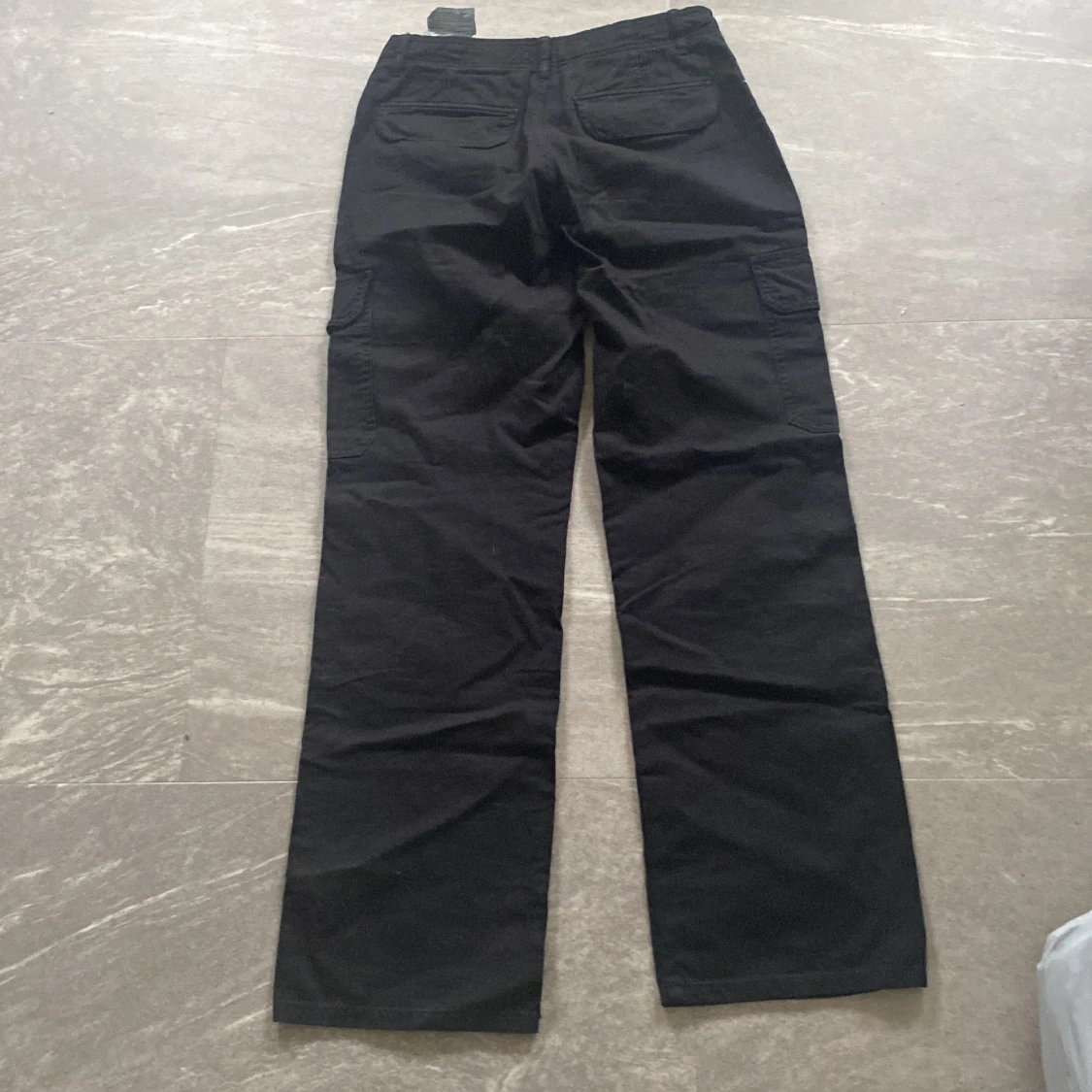 Svarta byxor  - 92