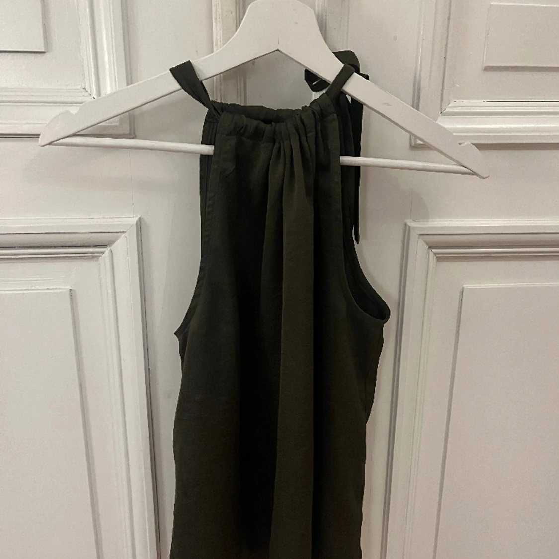 Mörkgrön halterneck topp