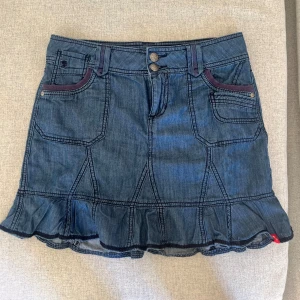Jeanskjol med volang - Jeanskjol med volang i storlek M