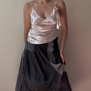 Vintage Pink Silk Ungaro Cami Tank - Dreamy Vintage Ungaro Silk Satin Camisole Tank with Feminine Ruffle Detail. Romantic Floral Print. Side Slits for Flowy Drape. Original Tagged size 36, Model Is 160cm (5”3) And Generally Fits XS/S. Very good condition. 100% Silk 