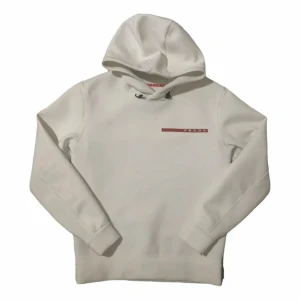 Prada hoodie vit - Söker denna vita Prada hoodien i storleken XS. helst upp till 400kr men Max är 500