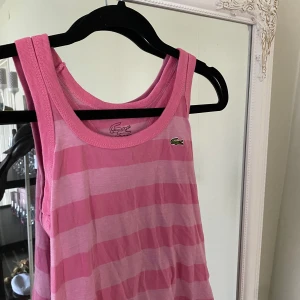 Lacoste linne  - Rosa randig är Lacoste linne 