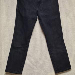 Svarta Wrangler jeans 