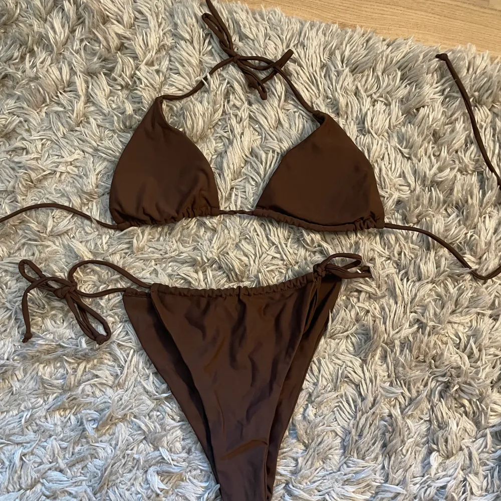Helt oanvänd brun bikini i storlek S. . Muu.