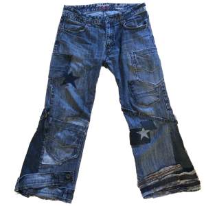 coola baggy / utsvängda patchwork jeans med mycket detaljer