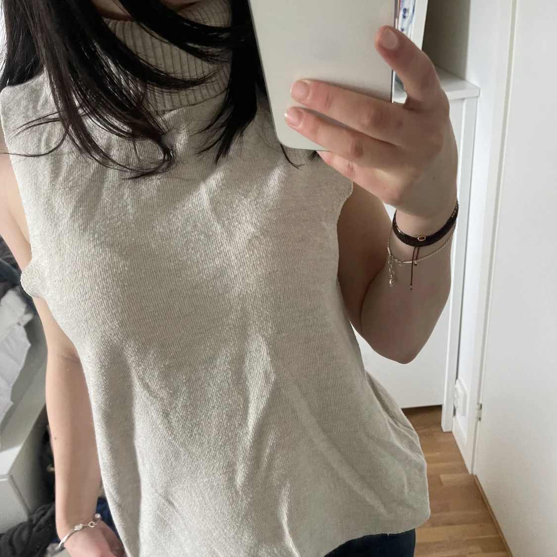 En stickad väst  - 90