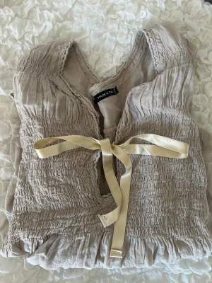 Blus - Beige blus i storlek s