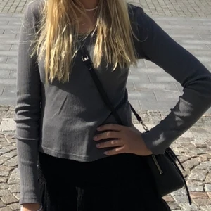 Grå Brandytröja - Fin grå tröja, använd en gång. 